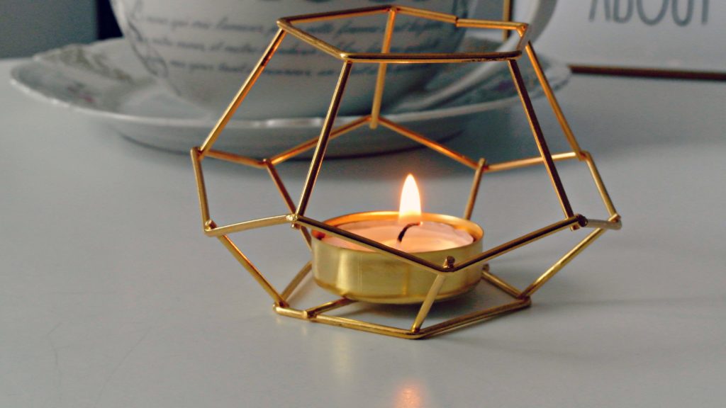 image of small gold candle holder for my post on dealing with anxiety