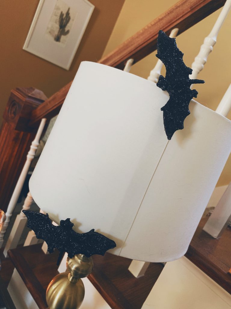 chic halloween decor, sparkly clip on bats on a white lampshade