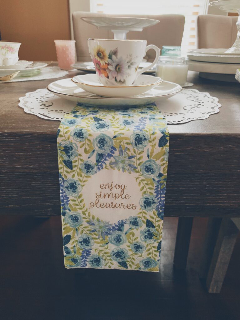 Tea party table setting with a beautiful tea napkin