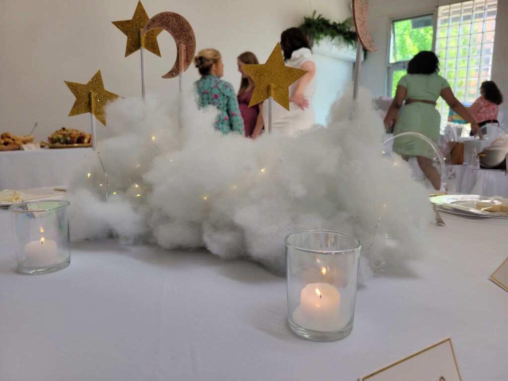 Fluffy cloud centerpiece with stars and moons for a cloud themed baby shower