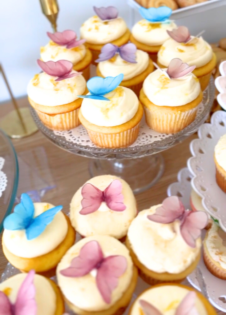 cupcakes with edible butterflies on top for a garden party