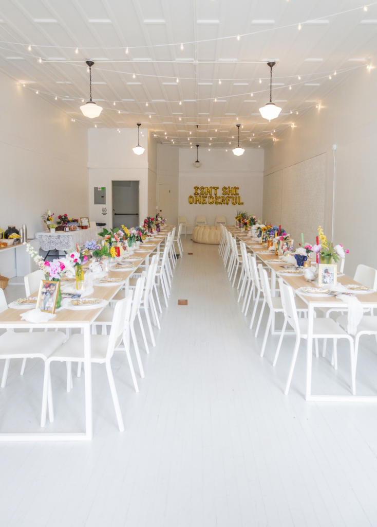 Tables and decor set and ready for a garden party themed birthday