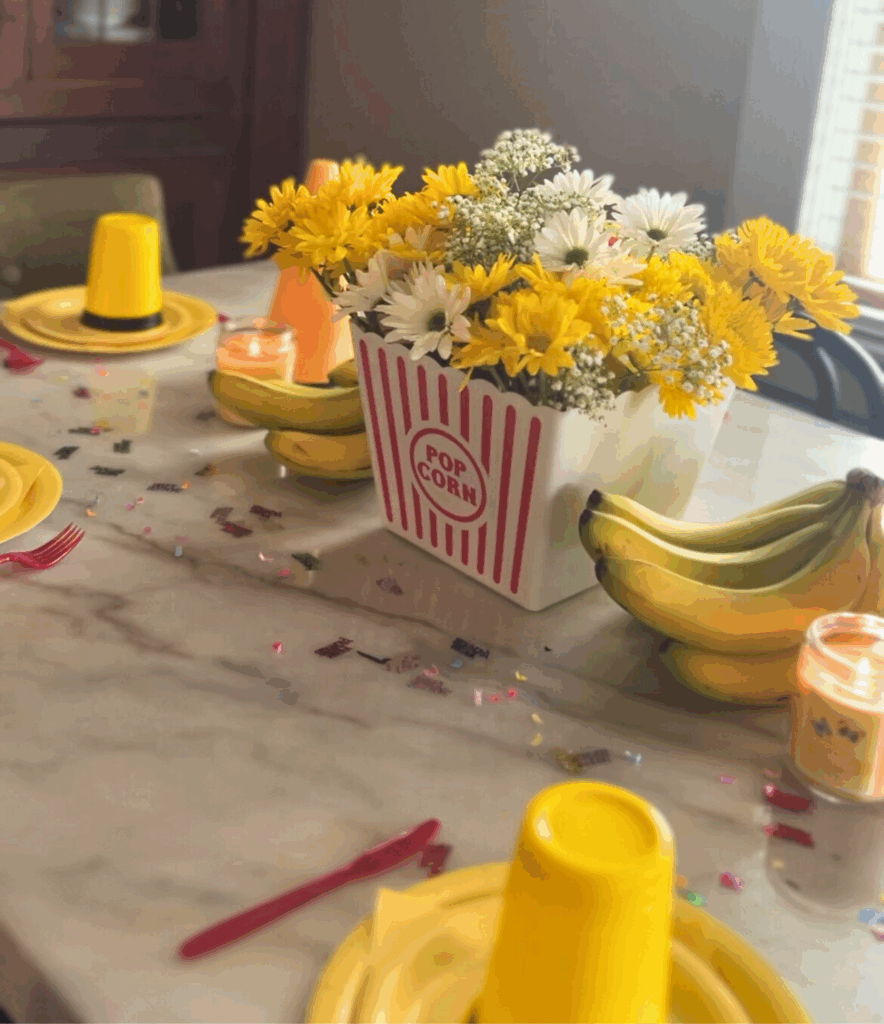 Table centerpiece for Curious George birthday party