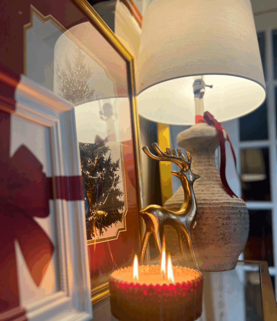 Elegant console table christmas decor for a blog post about the Ralph Lauren Christmas trend.