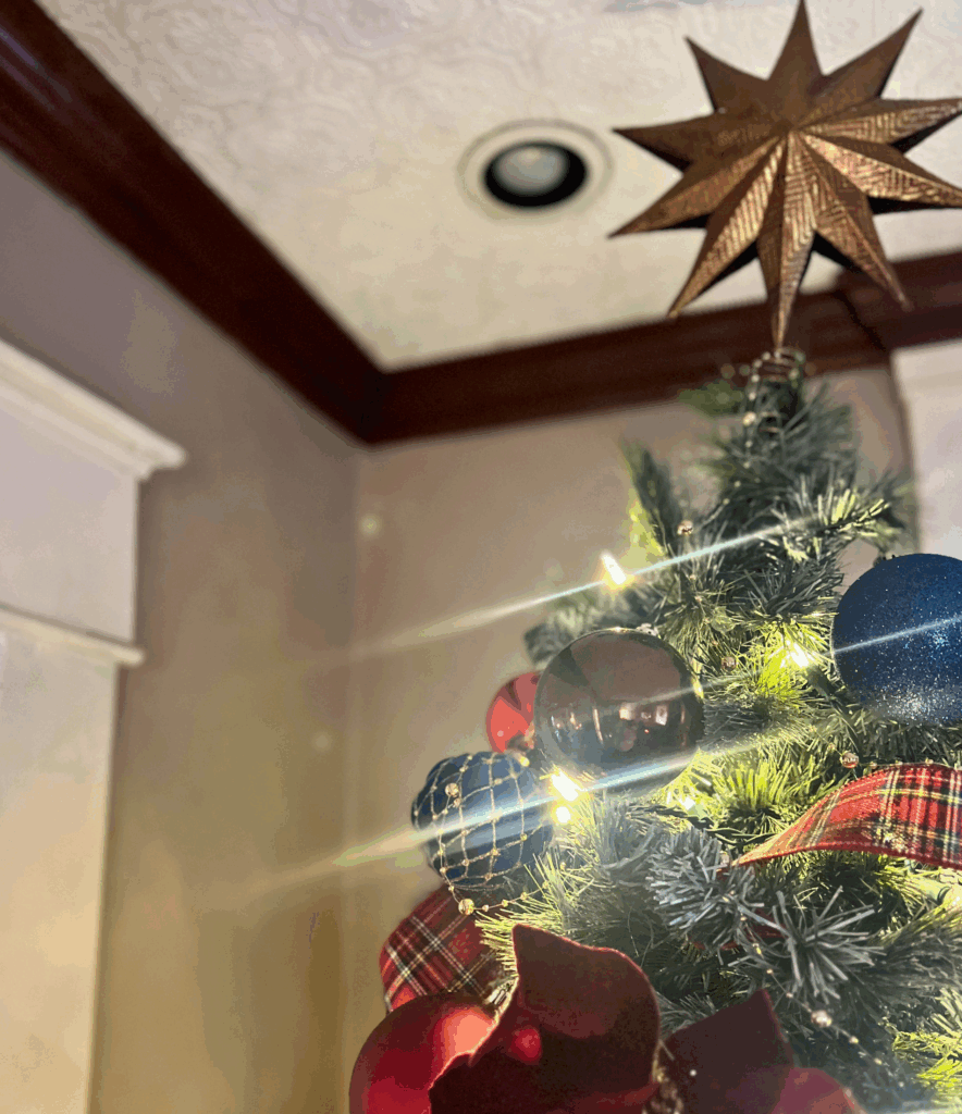 Antique gold star Christmas tree topper for a for a blog post about the Ralph Lauren Christmas trend.