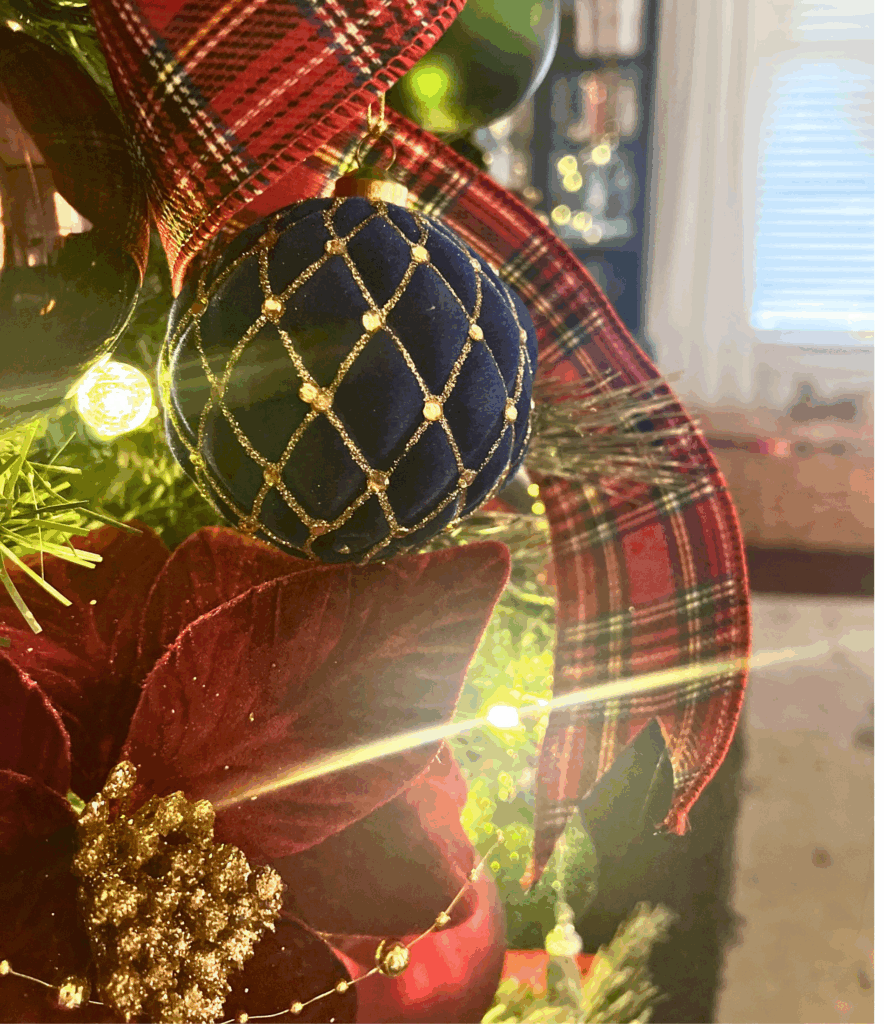 Blue velvet and gold christmas tree ornaments for a blog post about the Ralph Lauren Christmas trend.