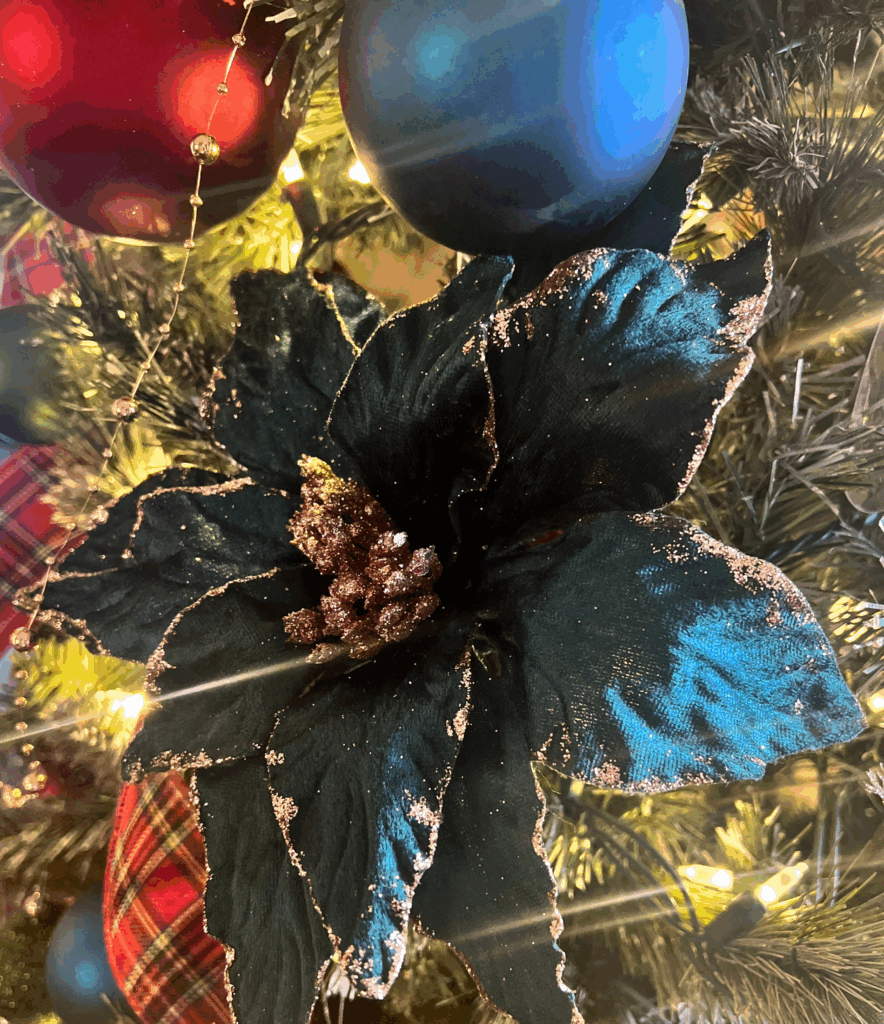 Velvet poinsettia christmas tree ornaments for a blog post about the Ralph Lauren Christmas trend.