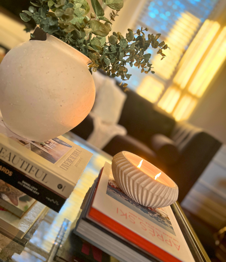 neutral winter decor with greenery and candle accents