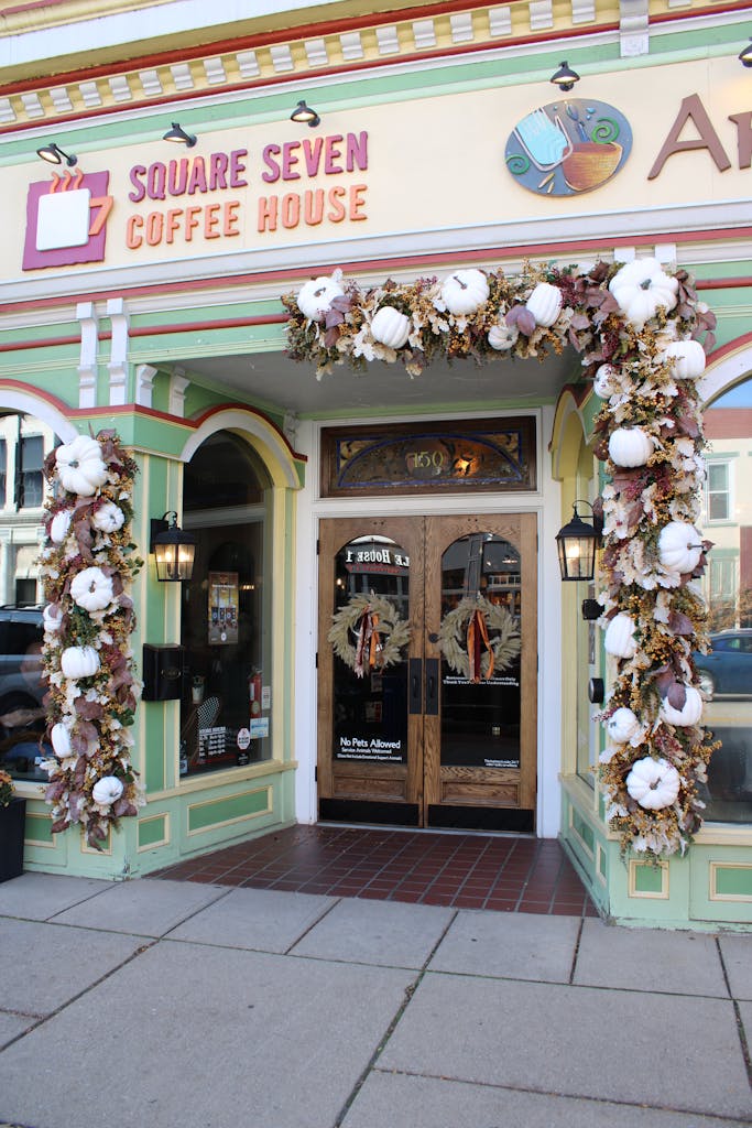 Inviting fall-themed storefront display at Square Seven Coffee House in Lancaster, Ohio.