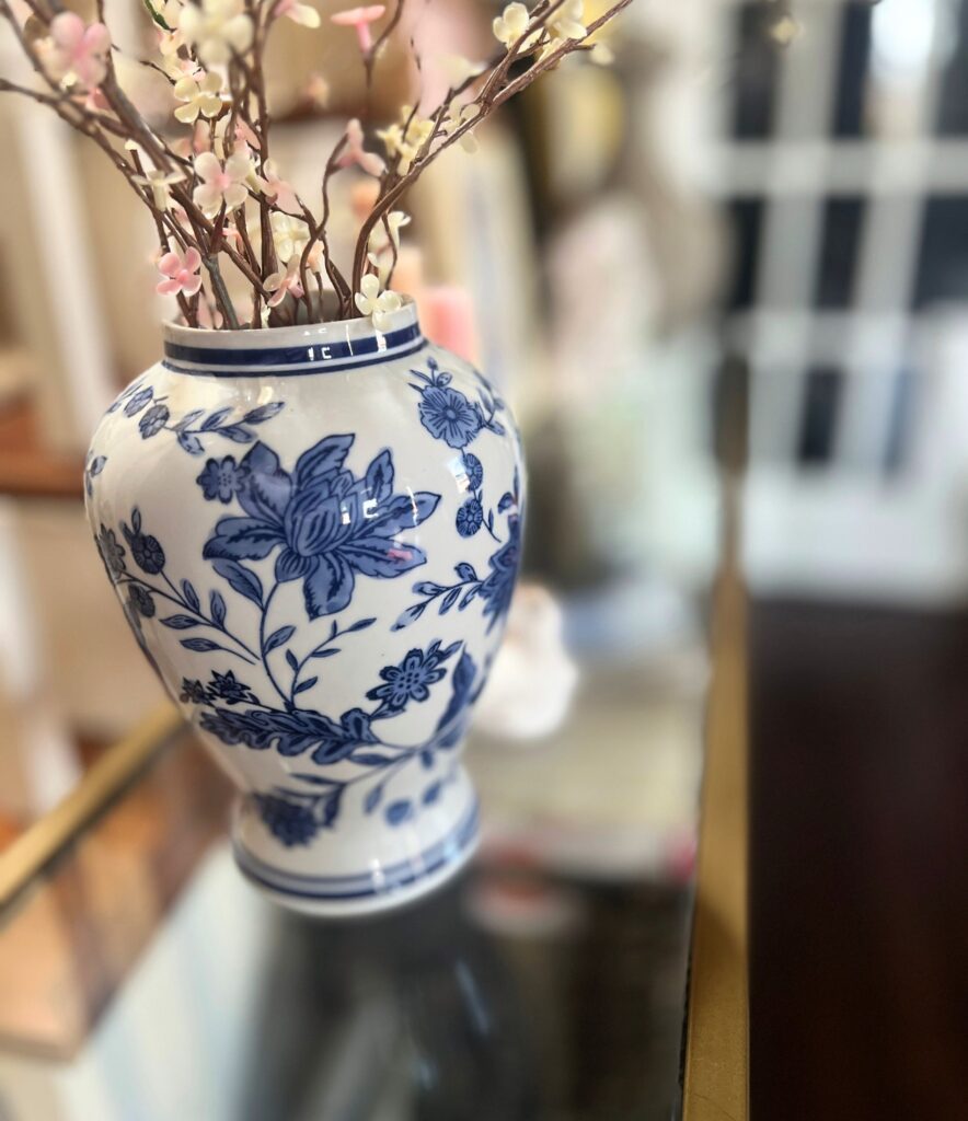 simple spring decor styled on an entry table with delicate florals and minimal Easter decor