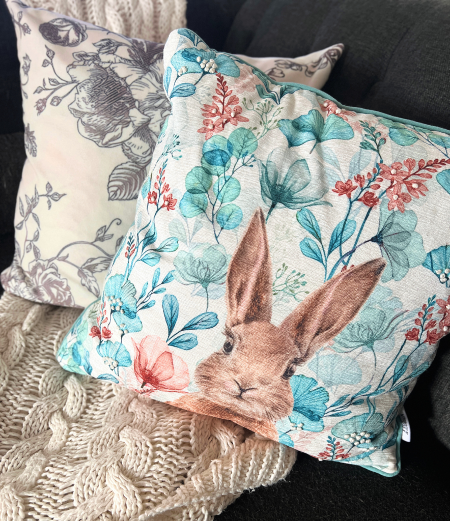 simple spring decor close-up of bunny throw pillow with soft patterned textures